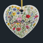 Ornamento De Cerâmica Flores Vintage Adoram Flores Florais Coração<br><div class="desc">Adicione um toque personalizado ao seu decoro doméstico ou feriado vivendo com este ornamento cerâmico. Este arranjo em forma de coração de flores selvagens vintage está lindamente entrelaçado com a palavra "Amor".</div>