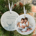 Ornamento De Cerâmica Floresta Elegante de inverno e Foto Personalizada<br><div class="desc">Enfeites de natal fotográfico que você pode personalizar para a vovó Excelente ou qualquer outra pessoa! O design tem uma elegante cena de aquarela de um lado de uma floresta invernal de pinheiros e um escória. O outro lado tem sua foto e seus nomes ou outro texto personalizado. O modelo...</div>