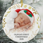 Ornamento De Cerâmica Foto de Natal do bebê<br><div class="desc">Este Enfeites de natal elegante é decorado com folhagem dourada sobre fundo branco. Facilmente personalizável com o nome do bebê,  ano e foto. Note que as pequenas estrelas brancas não estão incluídas na design. Original Watercolor © Michele Davies.</div>