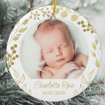 Ornamento De Cerâmica Foto de Natal personalizada para o Keepsasawn<br><div class="desc">Comemore a chegada do seu bebê com este único ornamento de fotos de manutenção. É decorada com folhagem de ouro pintada à mão e bagas. Facilmente personalizável com sua foto,  nome e data. Original Watercolor © Michele Davies.</div>