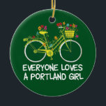Ornamento De Cerâmica Garota Portland Bonita<br><div class="desc">Um presente fofo em Portland,  Oregon,  com uma bicicleta vintage decorada com flores e "Todos Amam uma Garota Portland" escrito em verde. Esta bonito lembrança faz um belo presente para um hipster na maior cidade!</div>