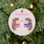 Ornamento De Cerâmica Hedgehugs! Feliz Natal de Hedgehog<br><div class="desc">NewParkLane - Bela Mancha, com dois pequenos ouriços bonitinhos apaixonados por um fundo cor-de-rosa, nevado, e uma citação doce e engraçada: 'Hedgehugs!' Todos os estilos, cores e tamanhos de texto podem ser modificados para ajustado das suas necessidades. Doce design de Natal ou Dia de os namorados! Verifique se há itens...</div>