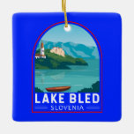 Ornamento De Cerâmica Lago Bled Eslovênia Viagem Retro Viagem Art Vintag<br><div class="desc">Design de arte vetorial do lago Bled. O lago Bled é um lago nos Alpes Julianos da região do Alto Carniolan,  no noroeste da Eslovênia,  onde se junta à cidade de Bled.</div>