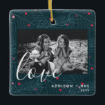Ornamento De Cerâmica Love Personalised Holiday Photo Christmas Gift<br><div class="desc">Um belo presente personalizado para os feriados. Este ornamento de fotos personalizado apresenta uma ilustração original de folhagem e bagas e a palavra "amor" em uma fonte grande e moderna de escrita. A foto,  os nomes e o ano são personalizáveis. Parte de uma coleção da Parcel Studios.</div>