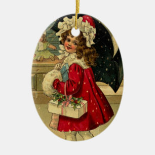 Ornamento De Cerâmica Menina que leva um presente do Natal