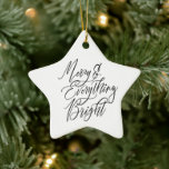 Ornamento De Cerâmica Merry & Everything Bright<br><div class="desc">Bring a touch of timeless holiday charm to your décor with this “Merry & Everything Bright” ceramic star ornament. Designed in a clean, modern style, this elegant piece features crisp black script lettering on a smooth white ceramic star, finished with a metallic gold hanging cord for a warm, festive touch....</div>