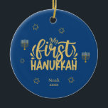 Ornamento De Cerâmica Meu Primeiro Chanucá Azul, Estrela, Menorah<br><div class="desc">Celebre a alegria do primeiro Chanucá com uma foto especial e personalizada do seu recém-nascido! Este design único apresenta cores elegantes de azul e ouro com Estrelas de David, uma menorah, e tipografia. Altere facilmente o texto clicando na opção "personalizar este modelo". Verifique se há itens correspondentes nesta coleção. Você...</div>