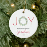 Ornamento De Cerâmica Meu Primeiro Natal como vovó Joy Wreath<br><div class="desc">Elegante ornamento de feriado com "JOY" com as letras "J" e "Y" em uma fonte vermelha sans serif e uma aquarela pintada de verde como letra "O". Abaixo está "Meu Primeiro Natal como Vovó" junto com o ano. Este ornamento bonito é um presente perfeito para uma nova avó. Elementos de...</div>