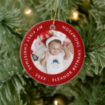 Ornamento De Cerâmica Meu Primeiro Nome De Foto Do Bebê De Natal Ano Rub<br><div class="desc">Meu Primeiro Nome De Foto Do Bebê De Natal É Ruby Red. Para comemorar esta época especial do primeiro Natal do seu bebê e uma encantadora manutenção para sua árvore em Christmases chegar. Troque facilmente sua foto pela amostra mostrada e personalize o texto que está curvo em torno de sua...</div>