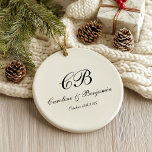 Ornamento De Cerâmica Monograma Elegante de Script Branco e Preto do ete<br><div class="desc">Adicione um toque de elegância do eterno ao seu decoro de férias com este monograma de escrita preto e branco, ornamento cerâmico, perfeito para celebrar momentos especiais e criar guardas personalizados; apresentando um monograma clássico de roteiro em um design branco e preto, este ornamento faz um presente pensativo para recém...</div>