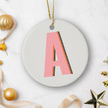 Ornamento De Cerâmica Monograma Inicial da Tipografia Retro Cor-de-Rosa<br><div class="desc">Adicione um toque ousado e vintage à sua decoração natalícia com este ornamento cerâmico monograma personalizado, apresentando um design de tipografia retrô cor-de-rosa vibrante e laranja. Perfeito para aqueles que amam uma estética lúdica e nostálgica, este ornamento pode ser personalizado com as suas iniciais, fazer-o como uma espécie de guardiã...</div>