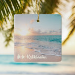 Ornamento De Cerâmica Natal da Ilha Tropical de Mele Kalikimaka<br><div class="desc">Este bonito Enfeites de natal costeiro apresenta uma linda fotografia de paisagem costeira no nascer do sol com uma bela tipografia que lê Mele Kalikimaka. Um modo havaiano giro de dizer Feliz Natal em estilo com uma bela fotografia da ilha. Leva-me à praia este feriado.</div>