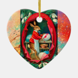 ORNAMENTO DE CERÂMICA NEVES COM COELHO PINTANDO OVOS ORIENTADORES