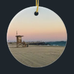 Ornamento De Cerâmica Newport Beach em Sunset, Califórnia<br><div class="desc">Vista de Newport Beach da torre salva-vidas 52,  olhando para o sul em direção ao cais. Céus rosados com areia brilhando também. Foto: novembro de 2022.</div>