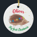 Ornamento De Cerâmica Nome Cute Hedgehog Baby Primeiro Natal<br><div class="desc">Primeiro ornamento de Natal personalizado,  com ilustração de ouriço decorada e bonitinha sobre fundo branco,  com pequenos flocos de neve dourados. O nome personalizado de bebê ou menina é o primeiro design de Natal.</div>