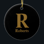 Ornamento De Cerâmica Nome inicial/primeiro/família Dourado em preto<br><div class="desc">Nome inicial/primeiro/família Dourado em preto</div>