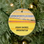 Ornamento De Cerâmica Ocean Shores, WA, Beach Sunset Photo<br><div class="desc">Abstrato com aspecto azul pastel e amarelo na costa entre a praia arenosa e o mar. A fotografia foi tirada ao pôr do sol na aldeia de Ocean Shores, Washington, na Península da Olimpiadas no noroeste do Pacífico excelente. Os observadores de beija-flores e os beachcombers voam para esta área para...</div>