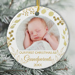 Ornamento De Cerâmica Our First Christmas As Grandparents Gold Photo<br><div class="desc">This elegant Grandparents Christmas Ornament is decorated with gold foliage on a white background.
Easily customizable with baby's photo and year.
Original Watercolor © Michele Davies.</div>