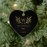 Ornamento De Cerâmica Ouro Winter Sprigs Monograma Black<br><div class="desc">Ouro Elegante monograma de inverno,  Enfeites de natal a preto. O Ornament apresenta espaços de modelo para o monograma inicial,  nome da família e ano. Correspondência com o padrão de inverno de ouro falso nas costas.</div>