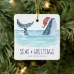 Ornamento De Cerâmica Papais noeis de baleia Natal costeiro e saudações<br><div class="desc">O tema náutico Enfeites de natal costeiro apresenta uma baleia aquática vestindo um Papai Noel nadando no mar com lanternas que decoram a cauda e uma legenda "Seas & Saudações" (ambas as linhas de texto podem ser personalizadas). Visite minha coleção "Papais noeis de baleia, focas e saudações" para coordenar cartões...</div>