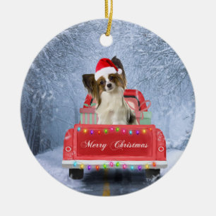 Ornamento De Cerâmica Papillon Dog em Neve sentado no Caminhão de Natal