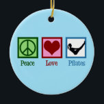 Ornamento De Cerâmica Peace Love Pilates Instrutor Boat Pose Christmas<br><div class="desc">Pilatos de Paz e Amor. Um presente de instrutor de pilates bonitinho com um sinal de paz,  coração e mulher esticando-se sobre uma bola de exercícios.</div>