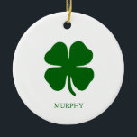 Ornamento De Cerâmica Personalized Green Clover<br><div class="desc">Simple Irish Four Leaf Clover Emerald Green Shamrock Design - Customize it with your own personalized names, words, colors! Celebrate good luck in style with this personalized Four Leaf Clover Design! Featuring a minimalist design with a simple yet modern touch, this mug can be customized with or without your name...</div>