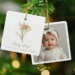 Ornamento De Cerâmica Photo Baby First Christmas Edelweiss Floral<br><div class="desc">O primeiro Natal do bebê! Personalize este adorável ornamento fotográfico com foto na frente e design de edelweiss com o nome do bebê e o ano no outro lado. Tão simples e doce para um presente personalizado. Baseadas em um Impressão botânico Vintage, essas flores têm o aspecto natural da aquarela...</div>