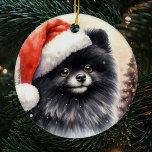 Ornamento De Cerâmica Pomerânia Preta Cura de Água Natal<br><div class="desc">Enfeites de natal Pomeraniano Preto de Aquarela Cuta com tons antigos e uma árvore de Natal em segundo plano. O presente perfeito para amantes da pomerânia que possuem um pom negro.</div>