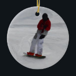 Ornamento De Cerâmica Presente do Esportes de inverno "se preparando par<br><div class="desc">Um legal Snowboarder está a fazer dos ajustes finais antes de atingir as encostas na estância de esqui de Silver Star Mountain. Excelente para crianças e desportistas de todas as idades. Trabalho de arte criado por Val Brackenridge ©.</div>