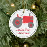 Ornamento De Cerâmica Primeiro Natal do Bebê do Trator Vermelho<br><div class="desc">Este design apresenta nosso trator vermelho giro com uma borda tracejada. Clique no botão personalizar para obter mais flexibilidade na modificação do texto! Variações deste design, cores adicionais, além de coordenar produtos estão disponíveis em nosso compro, zazzle.com/store/doodlelulu. Entre em contato conosco se precisar deste design aplicado a um produto específico...</div>