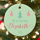 Ornamento De Cerâmica Primeiro Natal Whimsical - O Segredo do Bebê<br><div class="desc">Arranjando alegria em verde claro! Celebre a magia do primeiro Natal do seu bebê com o nosso ornamento do Primeiro Natal Whimsical. A canvas verde clara estabelece a palco da mensagem animadora 'Meu Primeiro Natal', personalizada com o nome do seu bebê, como a encantadora Elizabeth. Duas árvores cor-de-rosa e uma...</div>