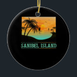 Ornamento De Cerâmica Retro Sanibel Island Florida Tropical Sunset Beach<br><div class="desc">Apresentando um pôr do sol e palmeiras,  este design é o perfeito lembrete de umas férias relaxantes na ilha Sanibel.</div>