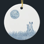 Ornamento De Cerâmica Romântica Bunny Love Blue Moon Personalize<br><div class="desc">Celebrar o casamento de recém-casados com um ornamento cerâmico perfeito para o Natal ou como decoração fofa. Minha pintura aquosa em azul clássico e branco mostra um lindo casal romântico de coelho robusto debaixo de uma grande lua azul com um design cardíaco. Simples e sincero, o ornamento reverte para incluir...</div>