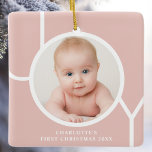 Ornamento De Cerâmica Rosa de Fotos Personalizadas do Primeiro Natal do<br><div class="desc">Este na moda mantém o Primeiro Ornamento Fotográfico de Natal de Baby é decorado com a palavra JOY em tipografia branca em fundo rosa de ouro. Facilmente personalizável com sua foto,  nome e ano.</div>