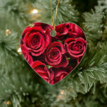 Ornamento De Cerâmica Rosas vermelhas<br><div class="desc">Estilo: Ornamento do Coração Traga muito mais alegria de férias para sua árvore com um ornamento cerâmico personalizado. Adicione fotos da família, imagens e mensagens pessoais a ambos os lados deste ornamento. Um fio de ouro torna fácil pendurar esta fantástica marca de sempre. Dimensões: 3" l x 2, 8" p;...</div>