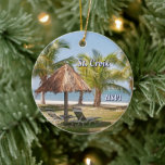Ornamento De Cerâmica Rua das Ilhas Virgens. Croix Tropical Beach Christ<br><div class="desc">Rua das Ilhas Virgens. O ornamento cerâmico Croix Tropical Beach Christmas é um maravilhoso ornamento a ser adicionado à sua coleção. Faz um bom enfeite de árvore de Natal tropical. Tem que relaxar duas cadeiras de praia, palmeiras, praia e a beatificante água azul-Caribe do mar. Aproveite os momentos. Foto de...</div>