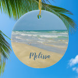 Ornamento De Cerâmica Sandpiper no litoral | Belo personagem de praia<br><div class="desc">Belo ornamento de praia com uma fotografia maravilhosa à beira-mar com um sangrento bonito na beira das ondas do oceano num dia ensolarado de verão. Lindas ondas de água verde-azul rolam para a praia arenosa onde seu nome é personalizado em uma tipografia teal fofa. Um belo presente de Natal para...</div>