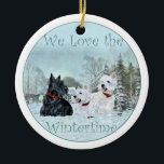 Ornamento De Cerâmica Scottie & Westies Winter Ornament<br><div class="desc">Este Ornamento Scottie e Westies vai parecer excelente na Árvore de Natal! Comprar um para você mesmo ou aquele amigo escocês e Westie amante! Criado do meu trabalho artístico original,  este ornamento é um prazer!</div>