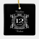 Ornamento De Cerâmica seda do aniversário de casamento da 12<br><div class="desc">Seu décimo segundo aniversário de casamento tem o dom tradicional é a seda. Este design de estilo crest é um design romântico para casais que celebram 12 anos de casamento. Se você quiser alguma ajuda para personalizar este design, por favor, entre em contato comigo, eles podem pedir a este botão...</div>