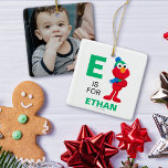 Ornamento De Cerâmica Sesame Street | Elmo de Inverno<br><div class="desc">O Quebra-Nozes com Elmo & Tango | Este gráfico divertido apresenta Elmo posando com um chapéu e cachecol de inverno.</div>