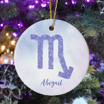 Ornamento De Cerâmica Sinal de Astrologia de Escorpião Bonito Personaliz<br><div class="desc">Este Enfeites de natal bonito de Scorpio roxo e lavanda apresenta seu sinal astrológico do Zodiac em um belo brilho como as constelações. Personalize este presente fofo e personalizado com o seu nome em lindos escritos cursivos para alguém com um aniversário no final de outubro ou no início de novembro....</div>