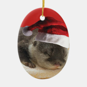 Ornamento De Cerâmica Sleepy Otter Santa Claus