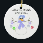 Ornamento De Cerâmica Snowman com Amigos Flakey<br><div class="desc">Um design bonitinho com um boneco de neve com braços de galho segurando um monte de flocos de neve coloridos...  diz que 'todos os meus amigos são flocos'... </div>