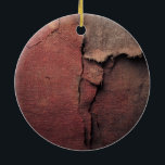 Ornamento De Cerâmica Tattered Canvas Abstract in Rust and Earth<br><div class="desc">Experience the beauty of imperfection with this evocative abstract piece. This artwork captures the intricate details of frayed edges and weathered fabric, blending deep crimson tones with muted earthy browns and ochre. The coarse, linen-like texture creates a visual depth that feels three-dimensional, mimicking the appearance of ancient parchment or a...</div>