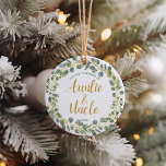 Ornamento De Cerâmica Tia e Tio Primeiro Natal<br><div class="desc">Celebrar a nova tia e o tio com esta coroa de Natal verde-aquática de eucalipto com folhas azuis e verdes e ouros - basta personalizá-la com o ano ou clicar em "personalizar ainda mais" para adicionar mais texto,  mudar a cor de fundo ou adicionar uma foto.</div>