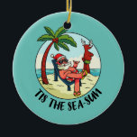 Ornamento De Cerâmica Tis Sea Sun Santa Claus Beach Summer<br><div class="desc">Este É O Natal De Verão Da Praia Sun Santa Claus No Mar Em Julho. Presente perfeito para seu pai, mãe, pai, homens, mulheres, amigos e familiares no Dia de Ação de Graças, Dia de Natal, Dia de as mães, Dia de os pais, 4 de julho de 1776 Dia Independente,...</div>
