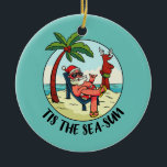 Ornamento De Cerâmica Tis Sea Sun Santa Claus Beach Summer<br><div class="desc">Este É O Natal De Verão Da Praia Sun Santa Claus No Mar Em Julho. Presente perfeito para seu pai, mãe, pai, homens, mulheres, amigos e familiares no Dia de Ação de Graças, Dia de Natal, Dia de as mães, Dia de os pais, 4 de julho de 1776 Dia Independente,...</div>