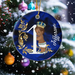 Ornamento De Cerâmica Um Primeiro Aniversário Personalizado Afro-America<br><div class="desc">Esta design foi criada através da arte digital. Pode ser personalizada na área fornecida ou personalizada alterando a foto ou acrescentando suas próprias palavras. Entre em contato comigo em colorflowcreations@gmail.com se você quiser usar este design em outro produto. Veja mais das minhas criações ou siga-me em www.facebook.com/colorflowcreations, www.instagram.com/colorflowcreations, www.twitter.com/colorflowart e...</div>