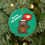 Ornamento De Cerâmica Urso de pelúcia de Natal com hábito de balões card<br><div class="desc">Ursinho de Natal com um balão de coração personalizado Cerâmica Ornament. Ideia personalizada de presente. Cor verde ou personalizada. Adicione sua própria saudação e nome. Urso bonito com chapéu de Papai Noel.</div>